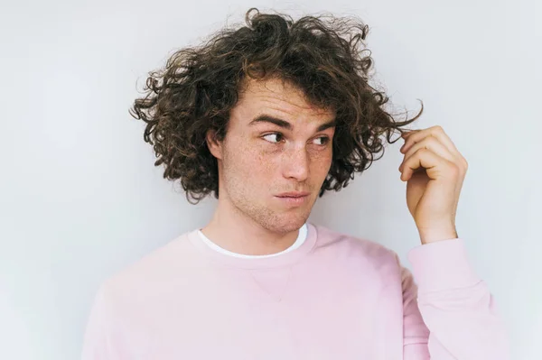 Horizontal Closeup Portrait Stylish Unhappy Male Curly Hair Poses Studio — Stock Photo, Image