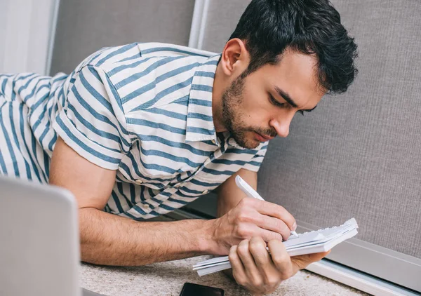 Handsome Serious Caucasian Male Student Learning Lessons Lying Carpet Home — Stock Photo, Image