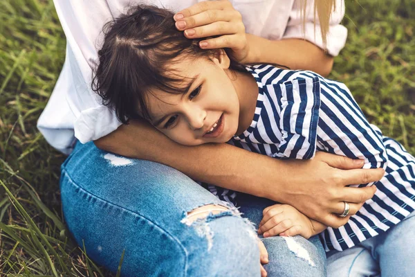 Image Happy Cute Little Girl Embrace Lying Her Mother Legs — Stock Photo, Image