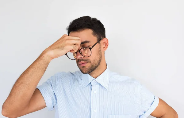 Studio Portrait Male Wears Spectacles Has Headache Massaging Nose Bridge — Stock Photo, Image