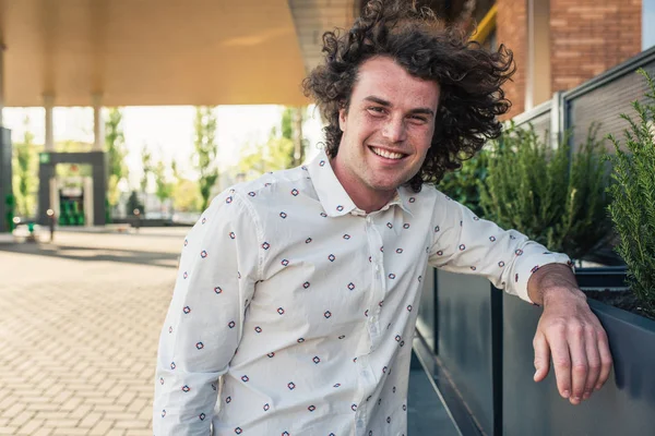 Young Attractive Happy Male Model Smiling Blowing Curly Hair Freckles Royalty Free Stock Images