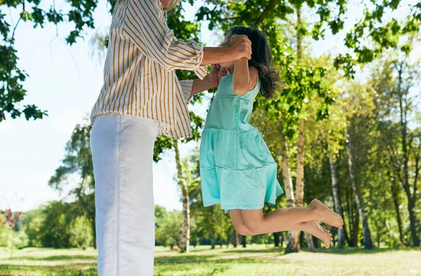 Cheerful Little Girl Playing Jumping Her Mother Park Grass Picnic — Stock Photo, Image