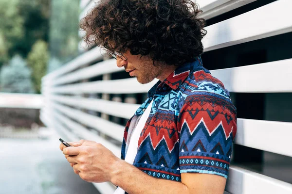 Side View Image Handsome Man Curly Hair Checking Mobile Phone — Stock Photo, Image