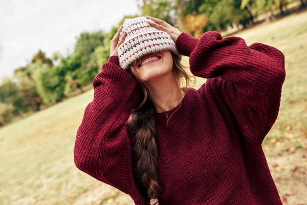 Horizontal Outdoor Portrait Cheerful Young Woman Wearing Red Sweater Hiding — Stock Photo, Image