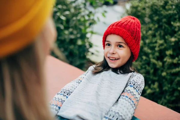 Happy Little Girl Red Knitted Hat Playing Her Mom Cute — Stock Photo, Image
