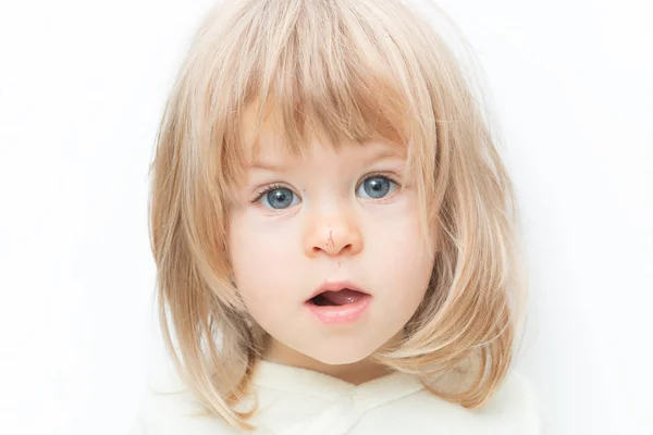 Close up portrait blond hair baby girl with a scratch on her nose isolated on the white background. Surprised female toddler, keeps mouth opened. Child safety concept, injuries from falling down. — Stock Photo, Image