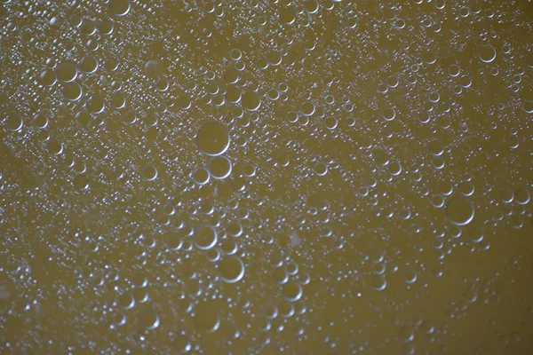 Oil Drop Water Golden Background — Stock Photo, Image