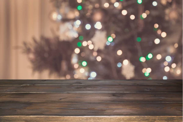 Wooden Tabletop With Cutting Board And Blurred Modern Kitchen With Christmas  Tree Stock Photo - Download Image Now - iStock