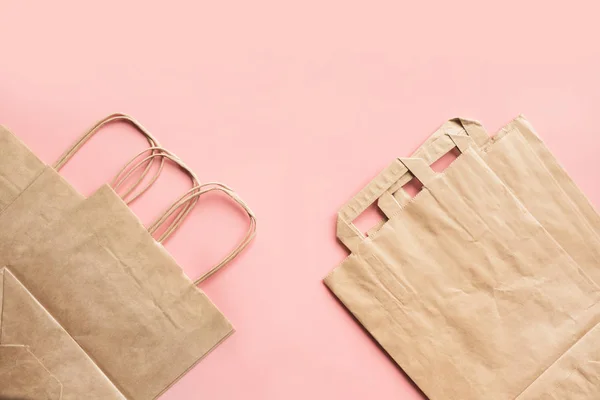 Paper bags for zero waste shopping on pink. — Stock Photo, Image