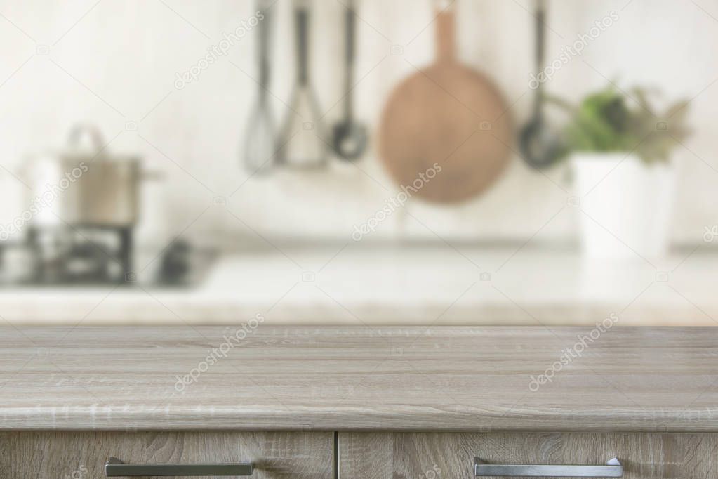 Modern kitchen with wooden tabletop, space for you and display products.