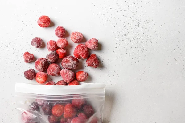 Frozen Strawberries Plastic Packet White Background View Stocks Copy Space — Stock Photo, Image