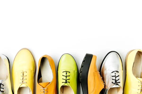 Stylish female spring or autumn shoes in various colors. Beauty and fashion concept. Flat lay, top view