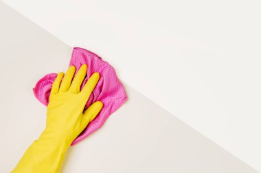 Soluk pembe arka plan temizleme el. Temizlik veya temizlik kavramı arka plan. Uzay kopyalayın. Düz yatıyordu, en iyi görünümü.