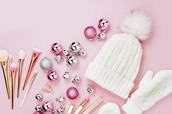 Hat Mittens Christmas Baubles Makeup Brushes Pink Background — Stock Photo, Image