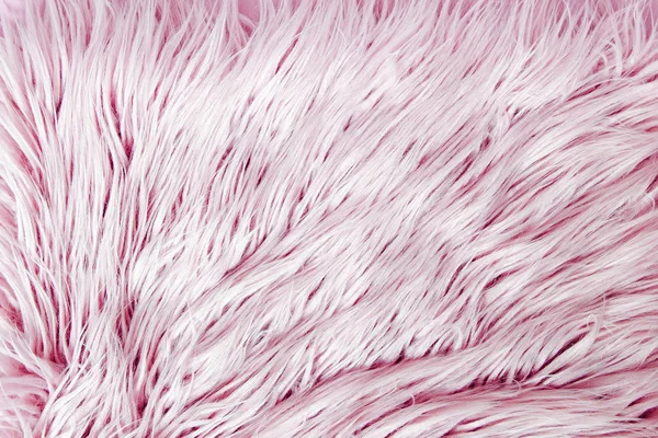 粉红色背景与蓬松的毛皮纹理 — 图库照片