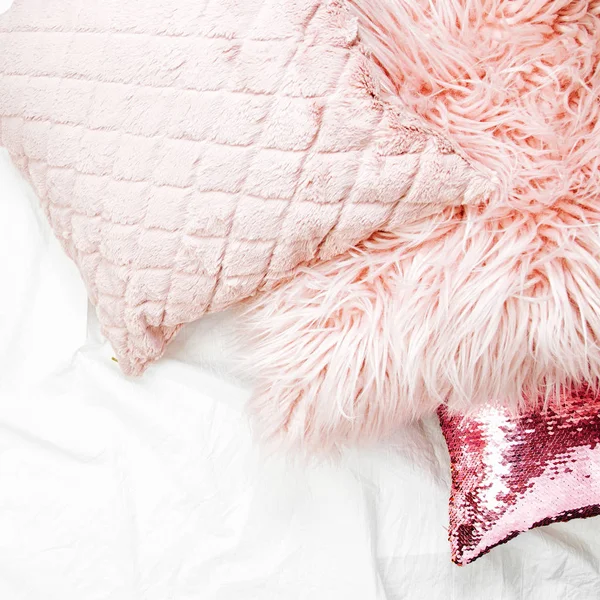 fluffy pillows and blankets