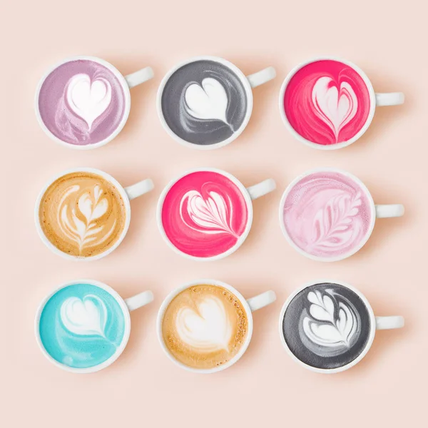 Uppsättning Kaffekoppar Sortimentet Blek Rosa Bakgrund Platt Lekmanna Top View — Stockfoto