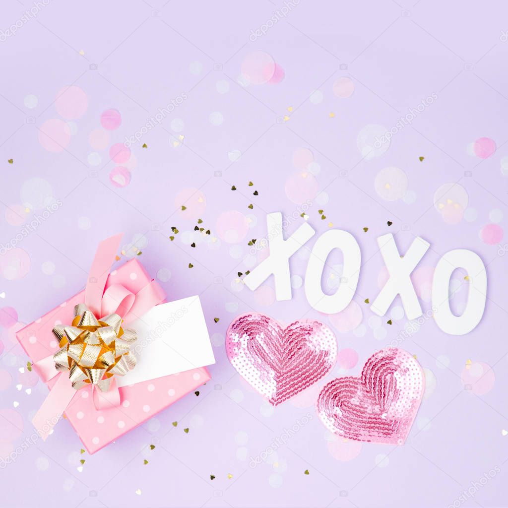 pink gift box with decorations and xoxo lettering