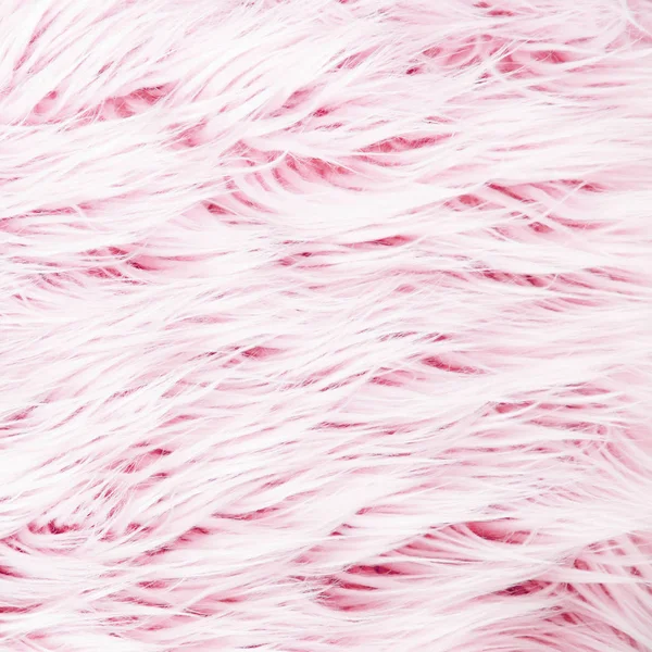 Pink fluffy fur background.  Flat lay, top view