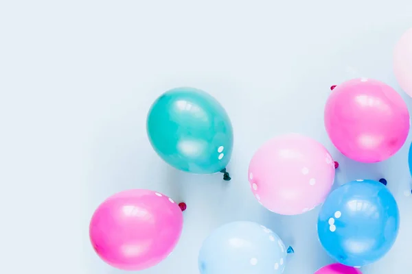 Bunte Luftballons Auf Pastellfarbenem Hintergrund Fest Oder Geburtstagsparty Flache Lage — Stockfoto