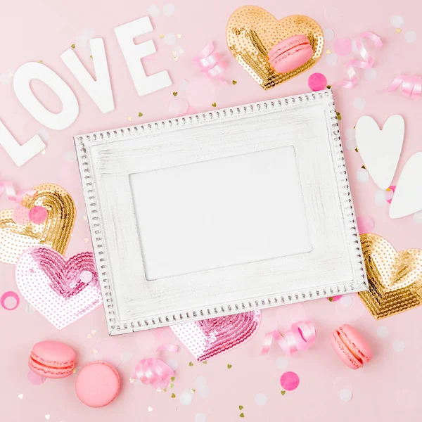 Mockup frame with  confetti and decorations. Festive or birthday party concept.. Flat lay, top view