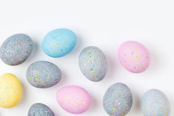 Fondo Con Huevos Pascua Color Rosa Pálido Azul Amarillo Gris — Foto de Stock