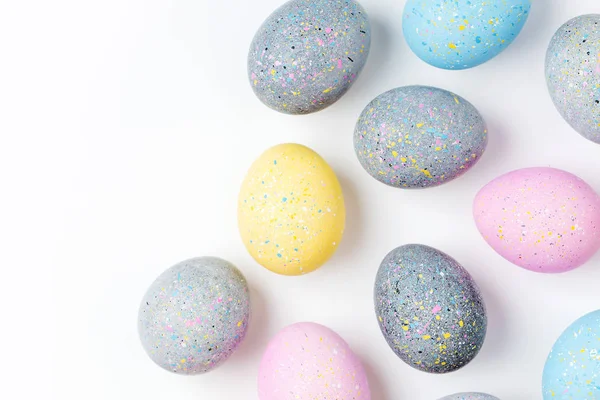 Fondo Con Huevos Pascua Color Rosa Pálido Azul Amarillo Gris — Foto de Stock