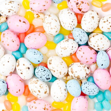 Pastel renklerde şık şeker arka plan. Paskalya kavramı. Düz yatıyordu