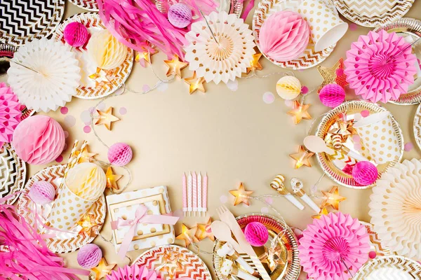 Birthday party background. Gold and pink color. Flat lay, top view