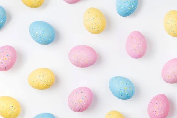 Fondo Con Huevos Pascua Color Rosa Pálido Azul Amarillo Composiciones — Foto de Stock