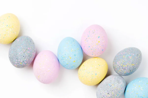 Fondo Con Huevos Pascua Color Rosa Pálido Azul Amarillo Gris — Foto de Stock