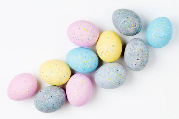 Fondo Con Huevos Pascua Color Rosa Pálido Azul Amarillo Gris — Foto de Stock