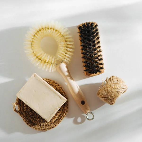 Natural dish brush and cleaning tools with Soap. Zero waste concept. Plastic free. Flat lay, top view