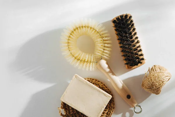 Natural dish brush and cleaning tools with Soap. Zero waste concept. Plastic free. Flat lay, top view