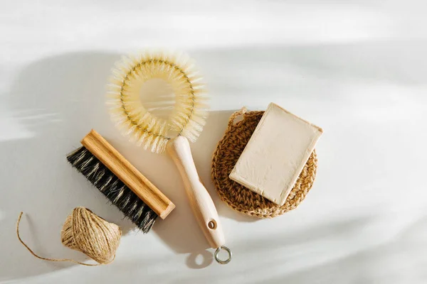 Natural dish brush and cleaning tools with Soap. Zero waste concept. Plastic free. Flat lay, top view