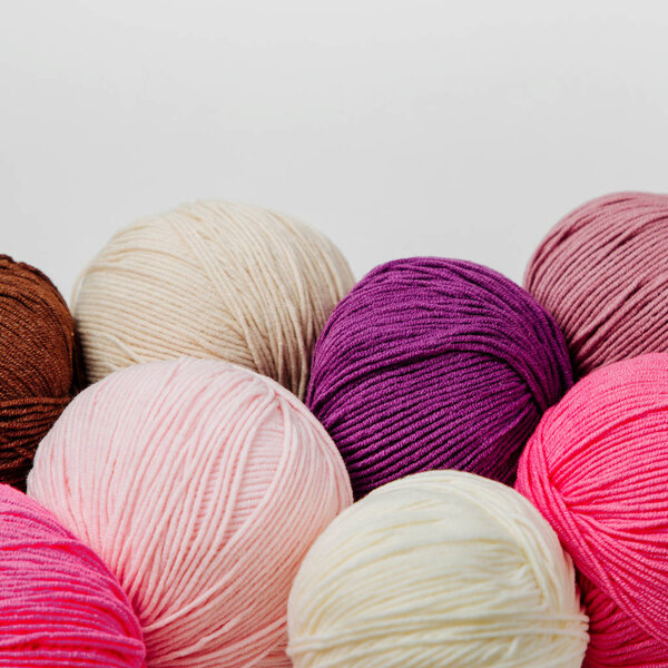Colorful yarn for knitting on White background. 