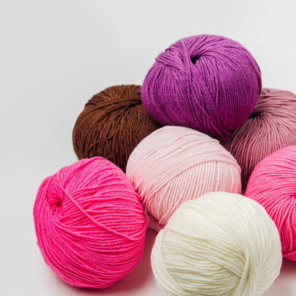 Colorful yarn for knitting on White background. 