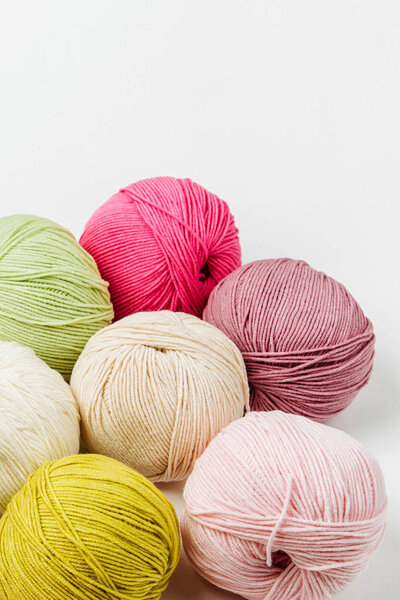 Colorful yarn for knitting on White background. 