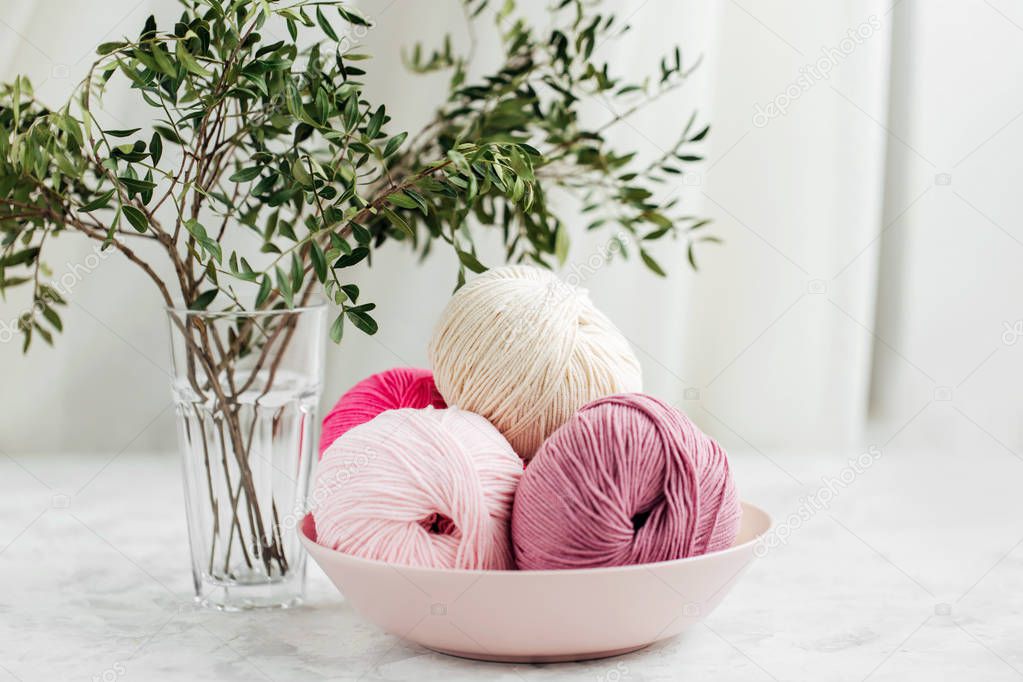 Yarn for knitting in pastel colors. 