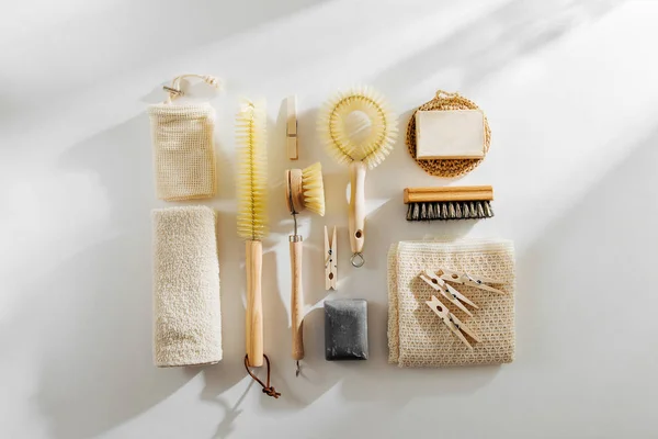 Natural dish brush and cleaning tools with Soap. Zero waste concept. Plastic free. Flat lay, top view