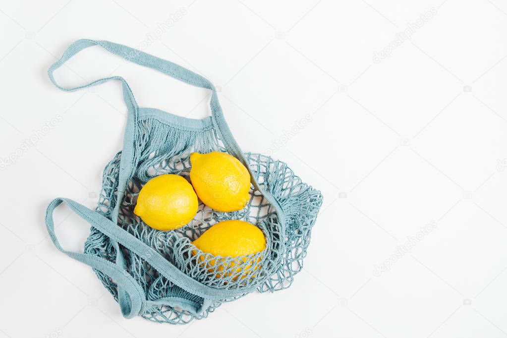 Cotton net bag with fruits. Sustainable lifestyle.  Eco friendly concept.
