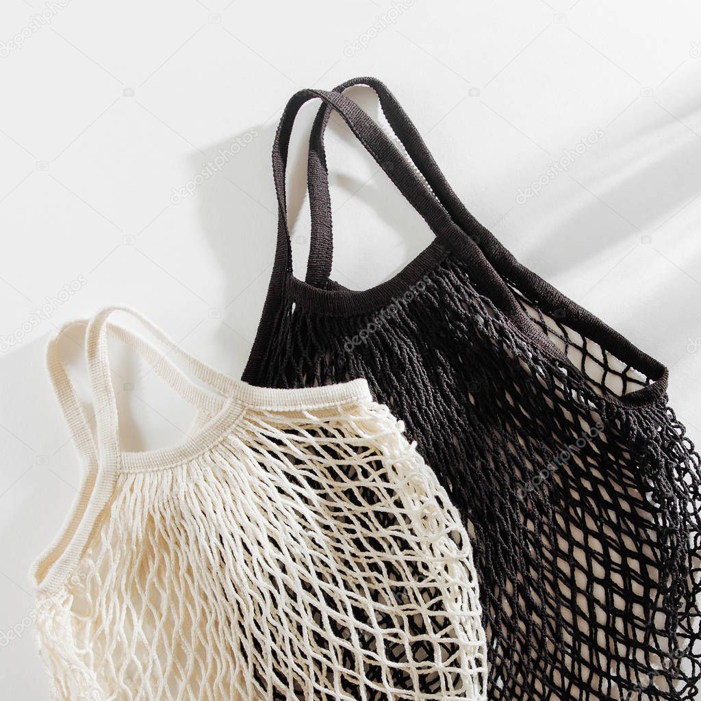 Reusable mesh bags on white background. Sustainable lifestyle concept. 