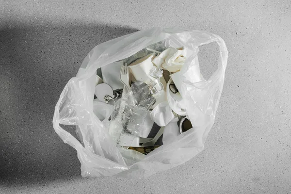 White single use plastic in plastic bag, concept of recycling plastic and ecology