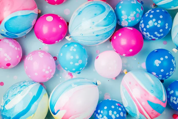 Colorful balloons on pastel color background, festive or birthday party concept