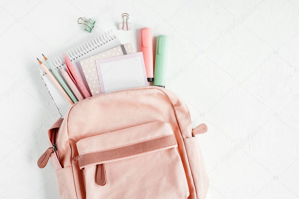 Flat lay with backpack, school supplies and books for study