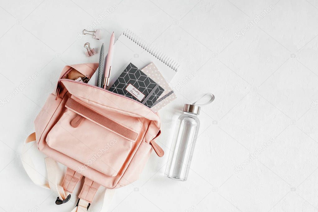 Flat lay with backpack, school supplies and books for study