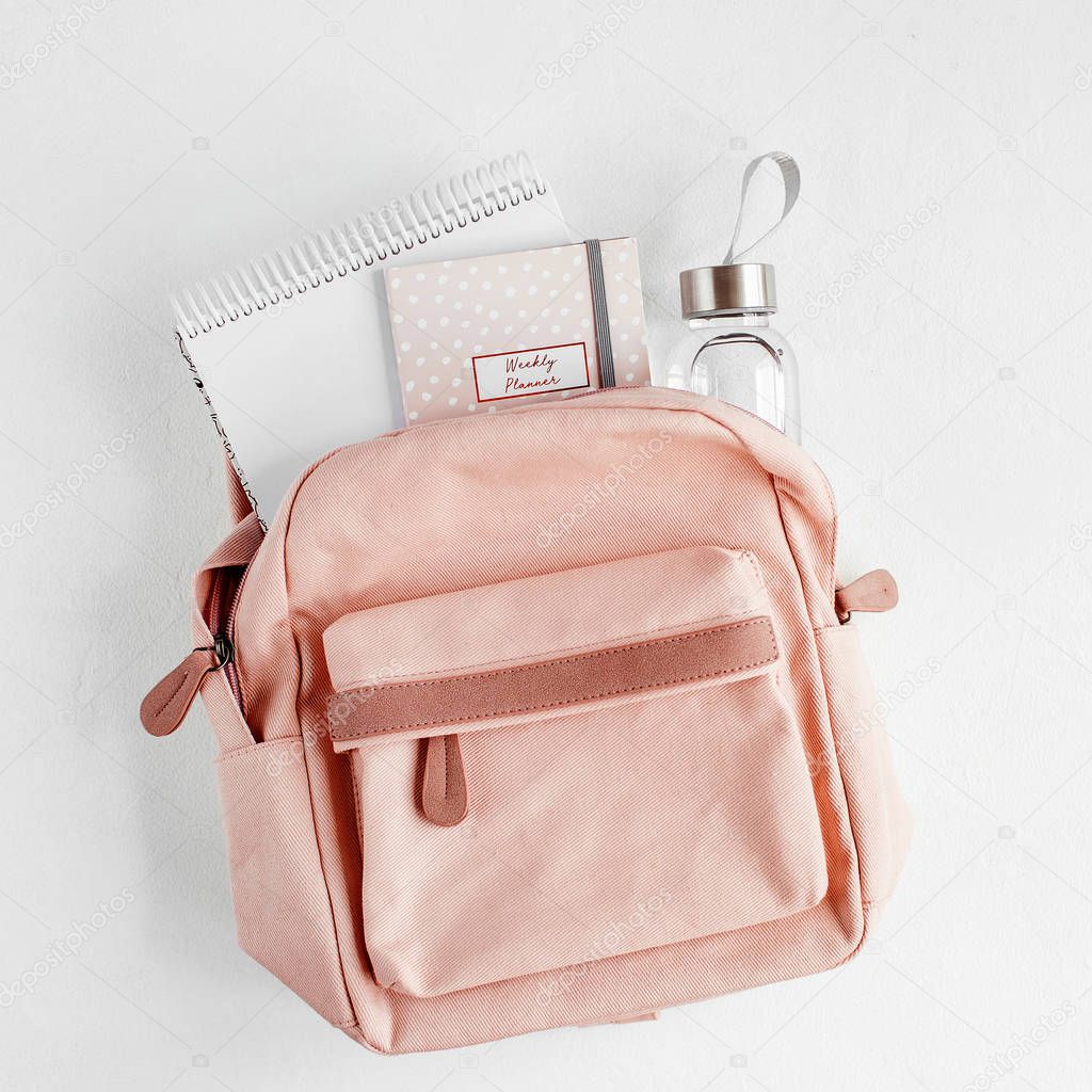 Flat lay with backpack, school supplies and books for study