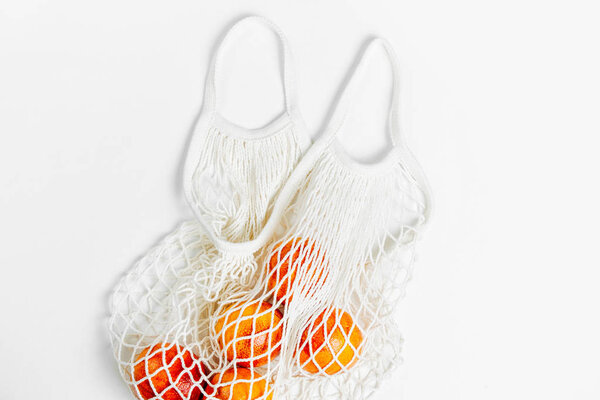 Cotton net bag with fruits, Eco friendly concept.