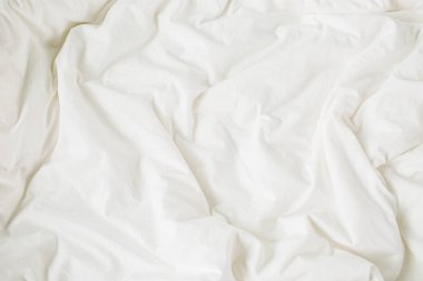 Beyaz çarşaflar. Rahat arka plan. Düz döşeme, üst görünüm