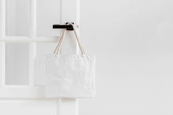 White eco bag mockup. Blank Shopping sack with copy space. Canvas tote bag. Eco friendly / Zero waste concept.